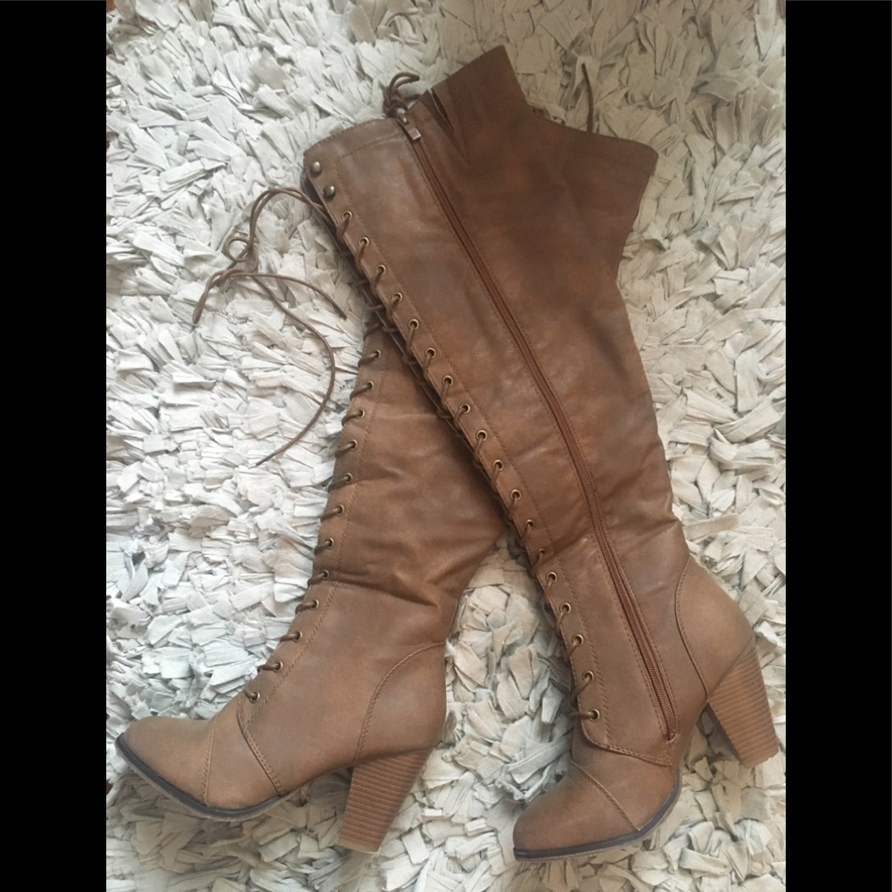 Knee high lace up boots